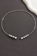 Collar Abierto de Cobre en Espiral con Circonita en Forma de Lágrima