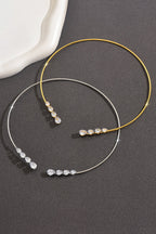 Collar Abierto de Cobre en Espiral con Circonita en Forma de Lágrima