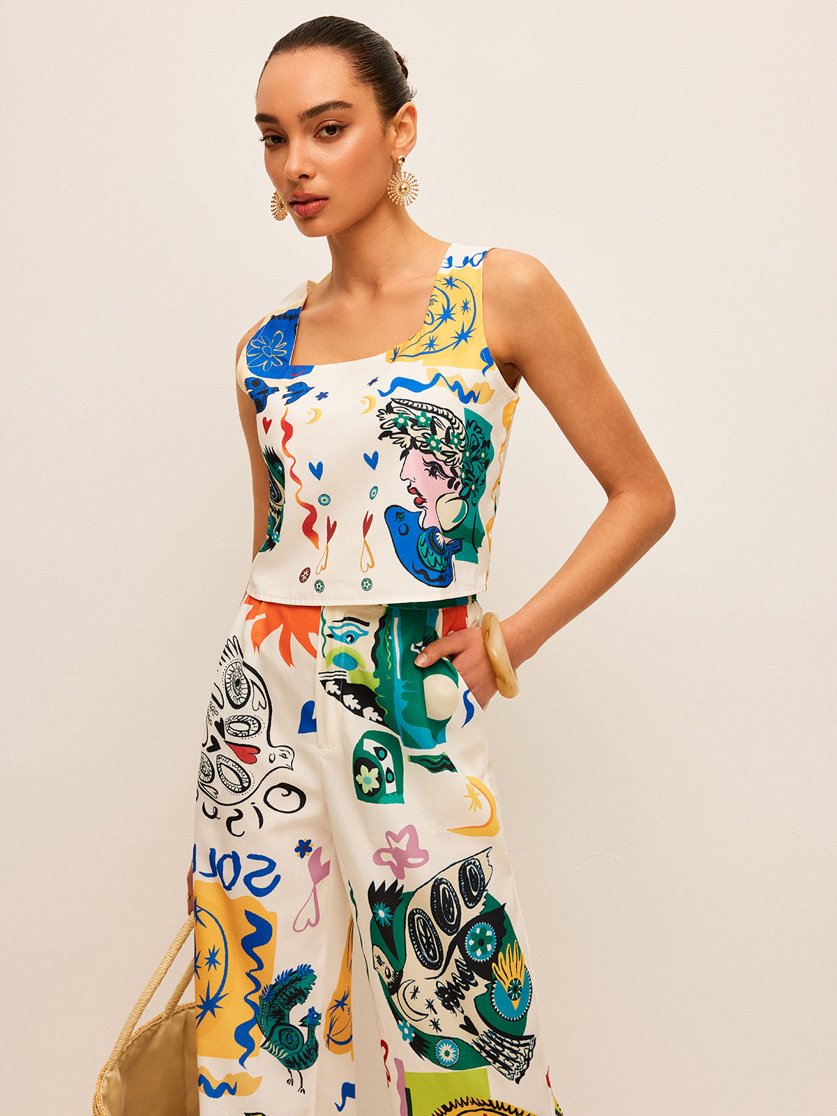 Conjunto de Top Corto con Estampado Gráfico y Pantalón Ancho