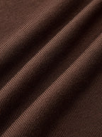 Conjunto de Tres Piezas: Top Cuello Alto, Cárdigan y Pantalón de Punto