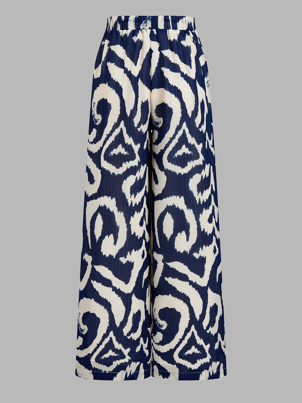 Conjunto de Top Corto con Lazo Trasero y Pantalón de Estampado Abstracto