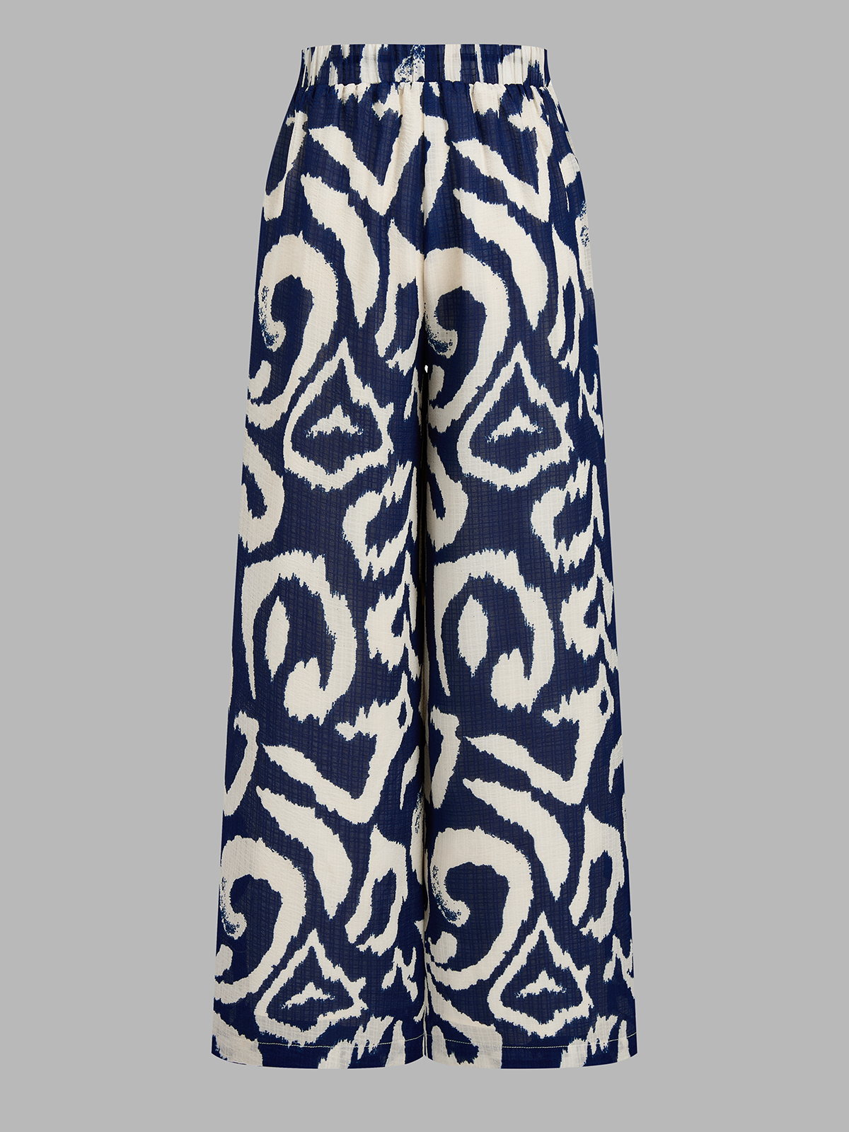 Conjunto de Top Corto con Lazo Trasero y Pantalón de Estampado Abstracto