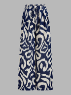 Conjunto de Top Corto con Lazo Trasero y Pantalón de Estampado Abstracto