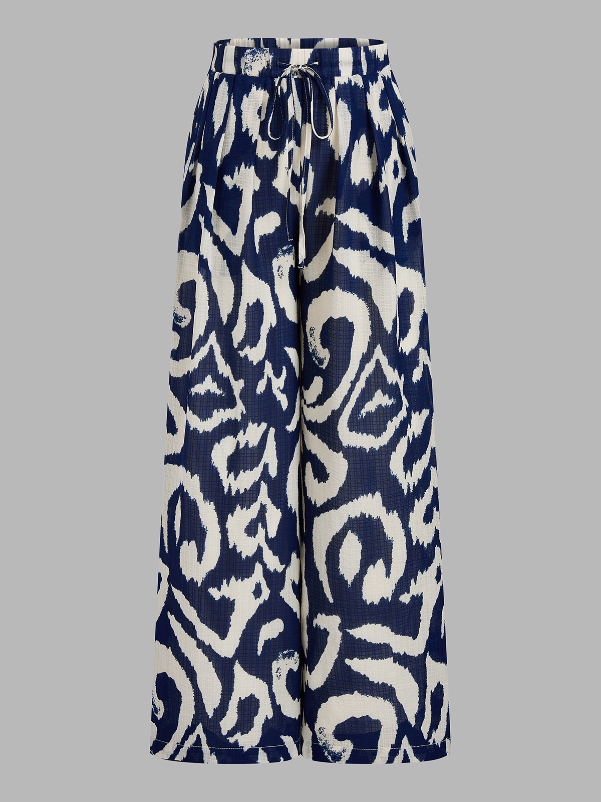 Conjunto de Top Corto con Lazo Trasero y Pantalón de Estampado Abstracto