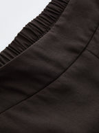 Pantalón Ancho de Dobladillo Irregular