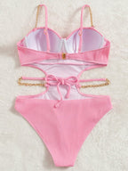 Bañador rosa con cadenas