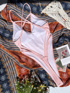 Bañador rosa con tirantes cruzados