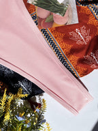 Bañador rosa con tirantes cruzados