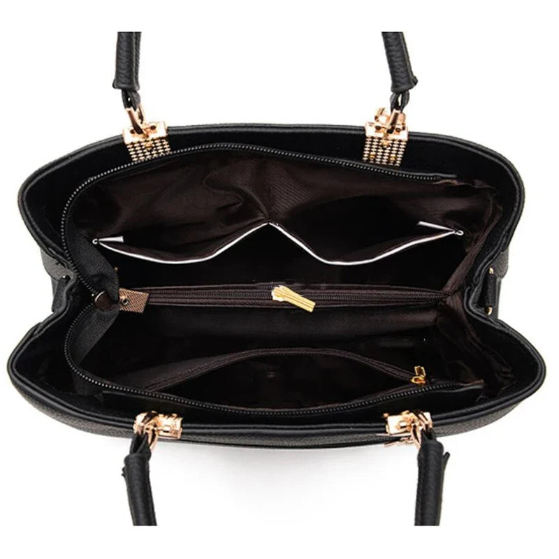 EUTERPE - Bolso Espacioso con Bandolera de Cuero Granulado