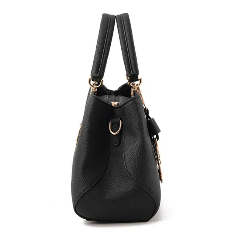 EUTERPE - Bolso Espacioso con Bandolera de Cuero Granulado