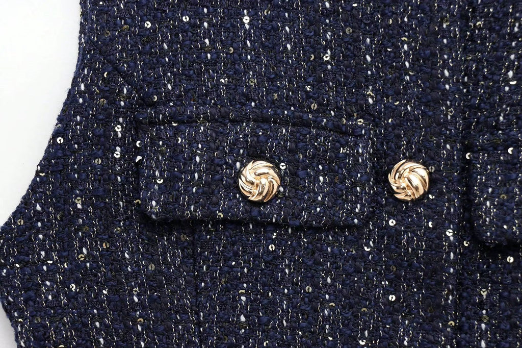 Chaleco de tweed con cinturón sin mangas