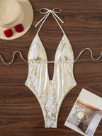 Bañador blanco con estampado dorado
