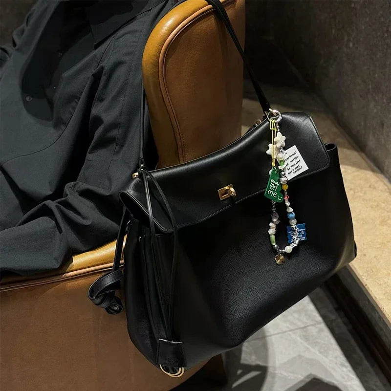 KELLY - Bolso de Piel Lisa Refinado