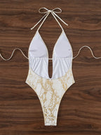 Bañador blanco con estampado dorado