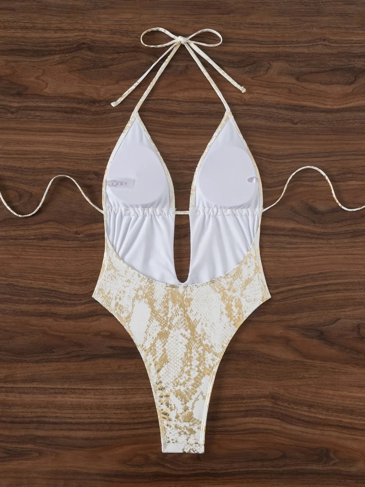 Bañador blanco con estampado dorado