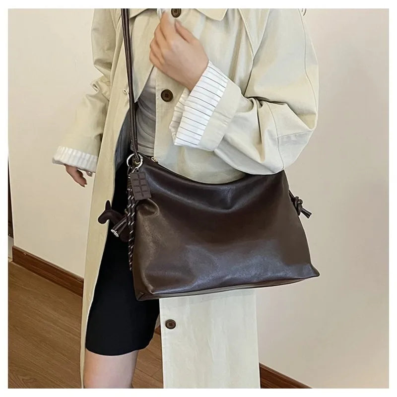 Coco – Bolso Bandolera de Piel Flexible para Mujer
