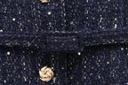 Chaleco de tweed con cinturón sin mangas