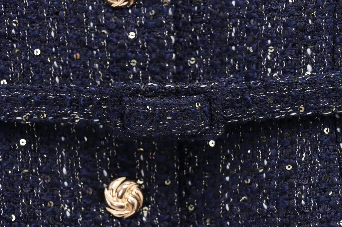 Chaleco de tweed con cinturón sin mangas