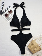 Bañador negro con lazado en cuello y recortes