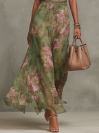 Serena | Robe longue fleurie fluide et élégante qui flatte la silhouette