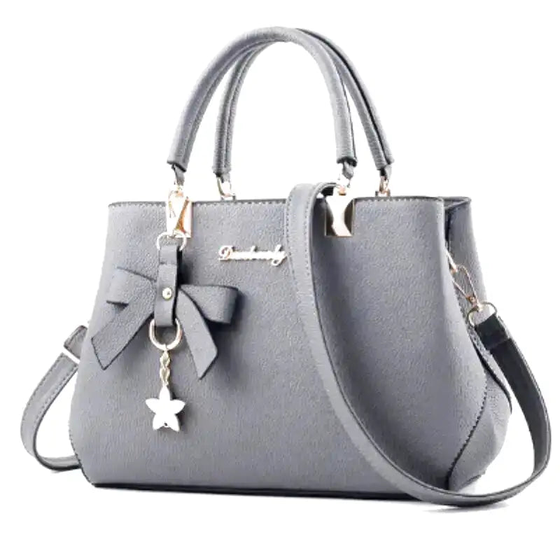 EUTERPE - Bolso Espacioso con Bandolera de Cuero Granulado