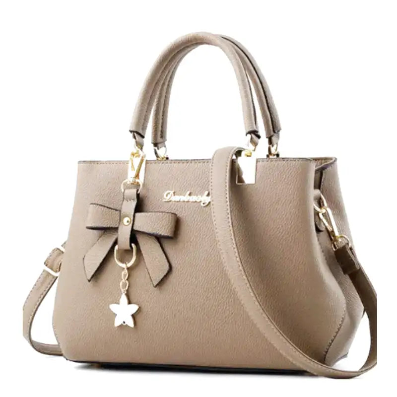 EUTERPE - Bolso Espacioso con Bandolera de Cuero Granulado