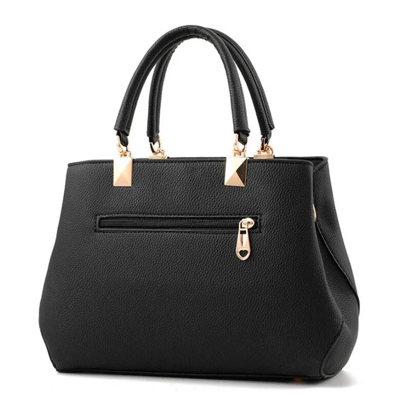 EUTERPE - Bolso Espacioso con Bandolera de Cuero Granulado