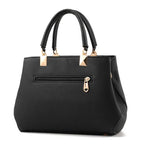 EUTERPE - Bolso Espacioso con Bandolera de Cuero Granulado