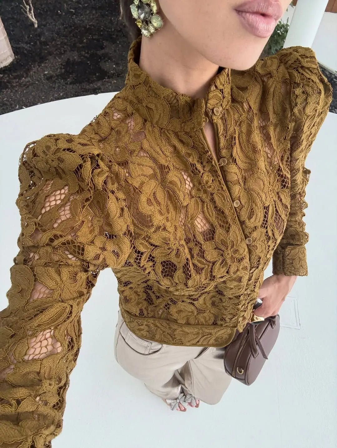 Blusa Azzurra de encaje translúcida