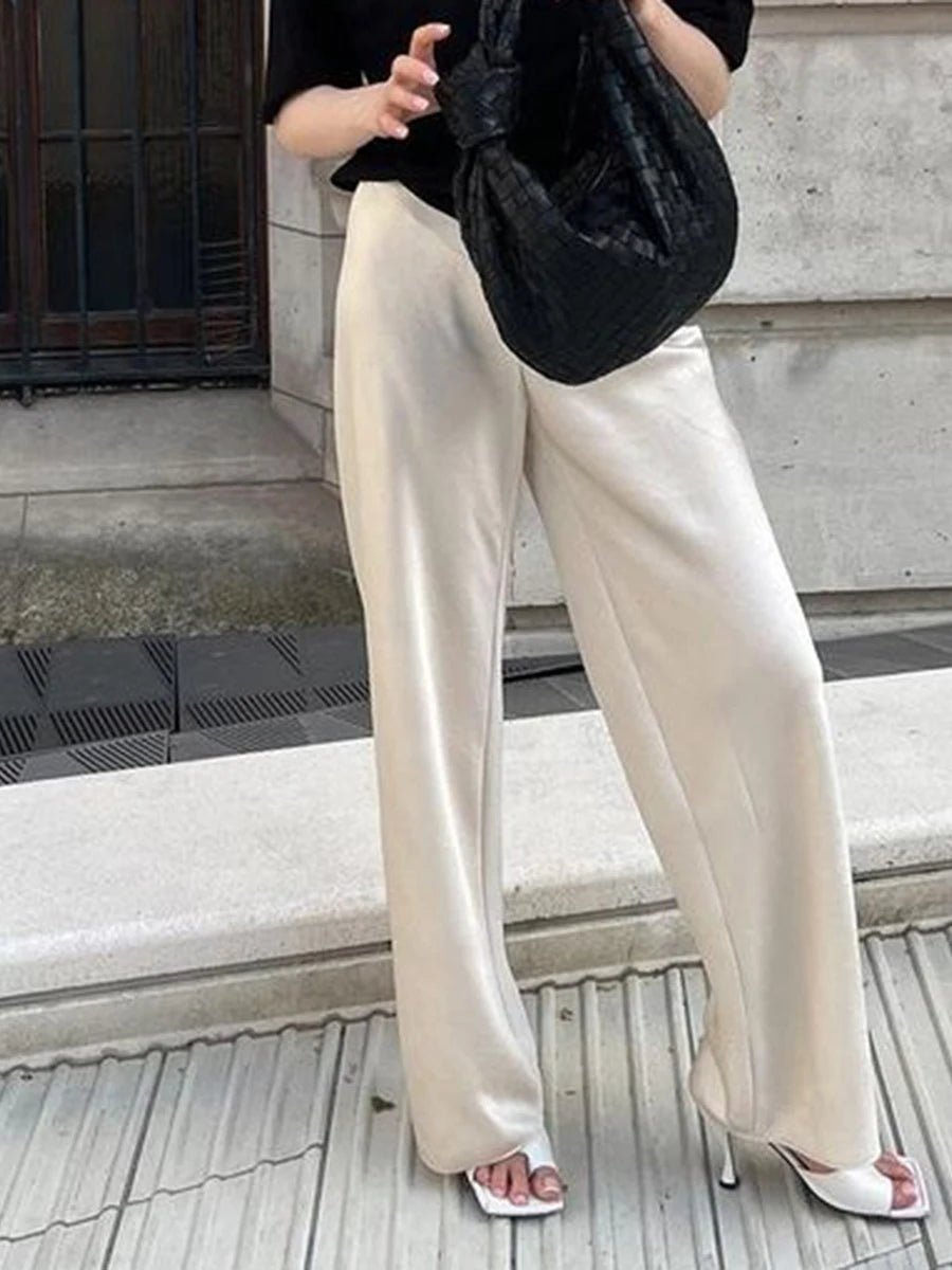 Pantalones anchos de satén de talle alto Norma