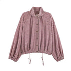 Chaqueta Olivia de cuadros con cordón y cuello alto