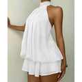 Vestido mini sin espalda de cuello halter Eden