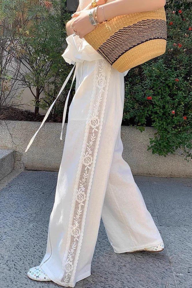 Clara pantalón recto de lino con inserciones de encaje