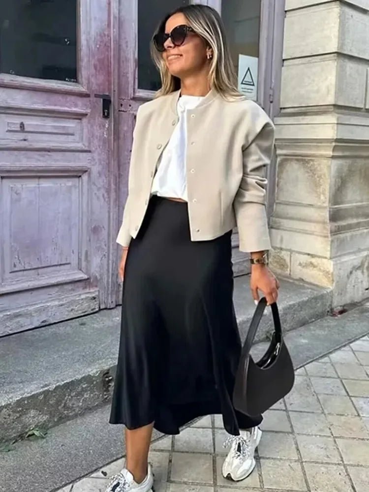Anais falda midi de satén negro de talle alto