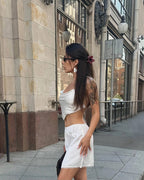 Falda mini Johana satinada con encaje